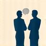 Two people conversing, illustrating a consultation